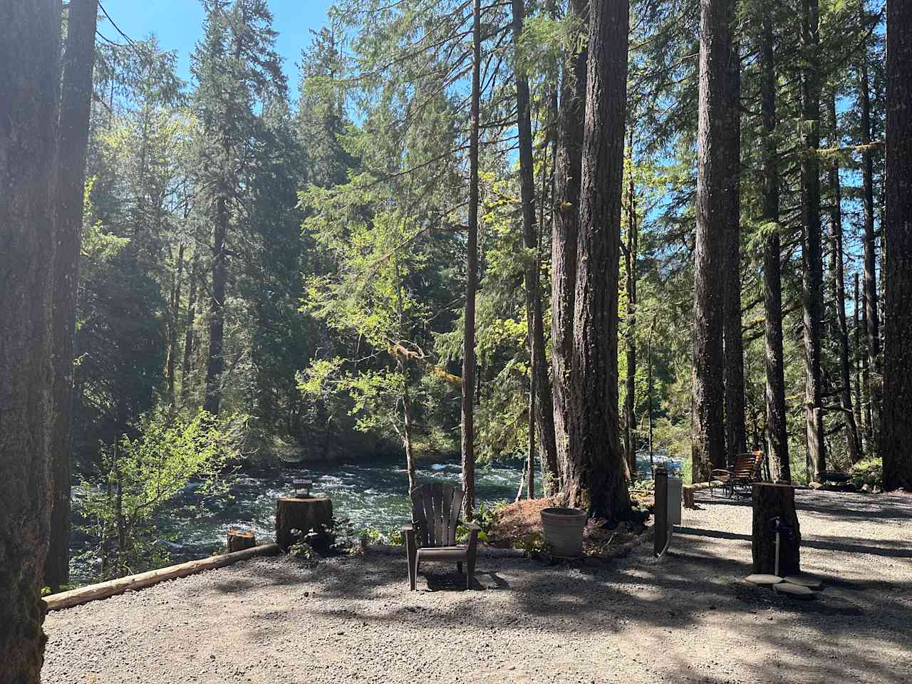 RV site with chairs and river views