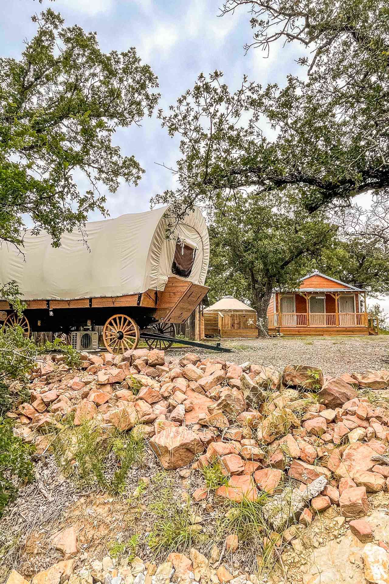 Conestoga wagon side exterior from another campsite 