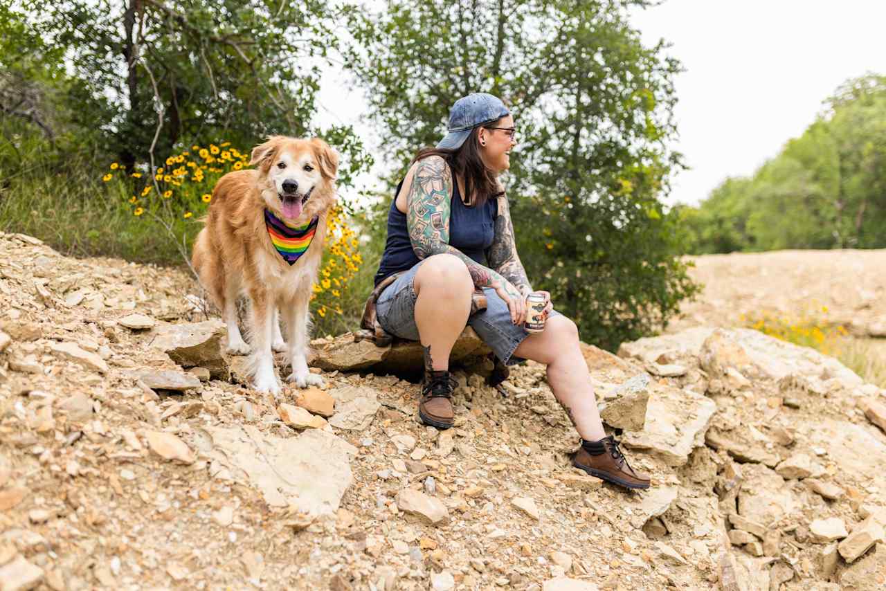 Hiking around the pond through the wildflowers with pets