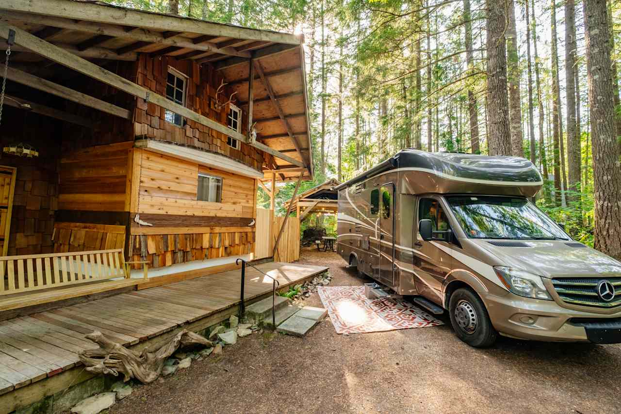 RV spot next to cabin