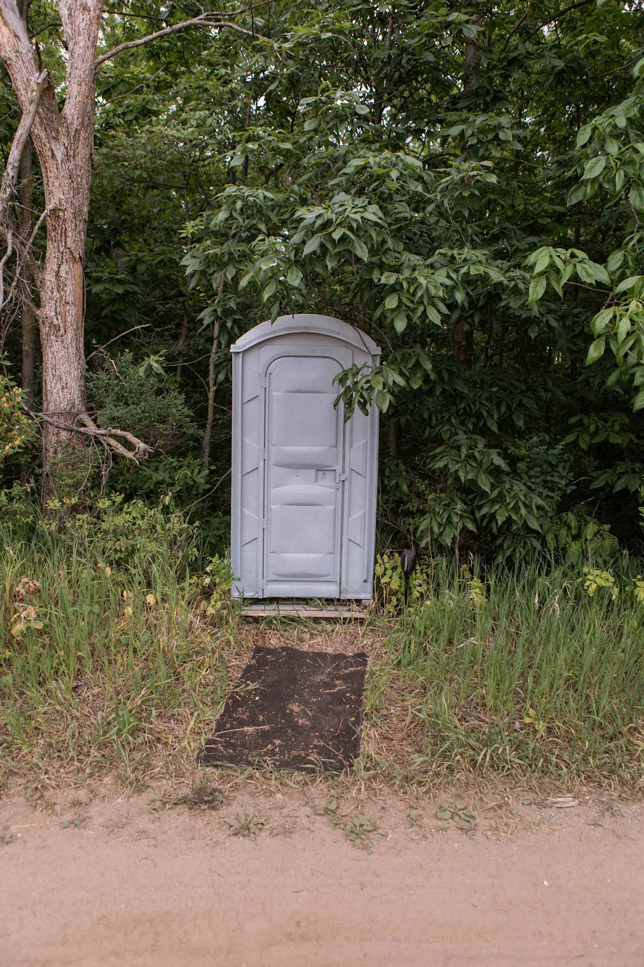 The bathroom is conveniently right next to the campsite!