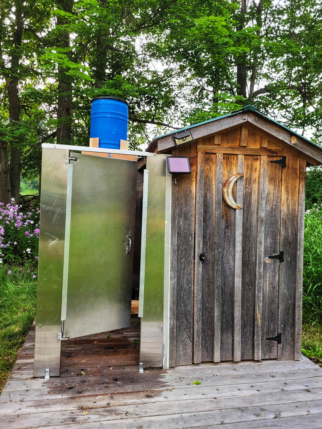 New for 2023 season! Stainless shower enclosure with a gravity fed (air temperature) shower. We will fill the barrel before you arrive. 