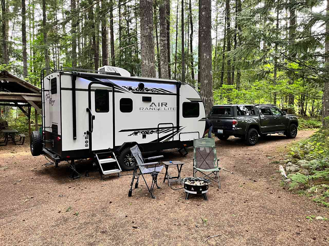 We backed in using first driveway option closest to hook ups and picnic table. Plenty of room for additional vehicles or another RV on 2nd driveway   