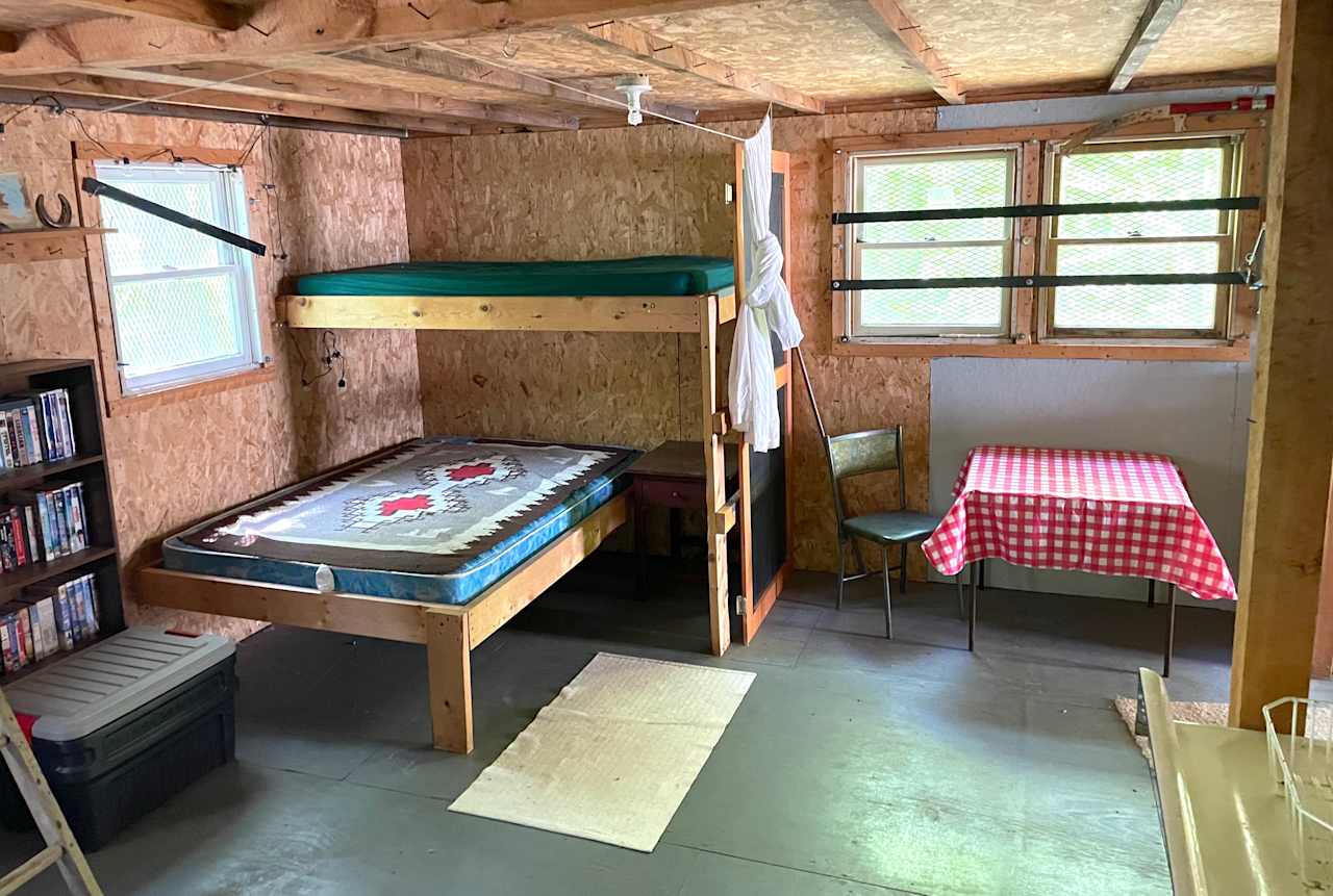 The cabin is one open space with built in bunks for 5 (one full sized bunk and three singles)