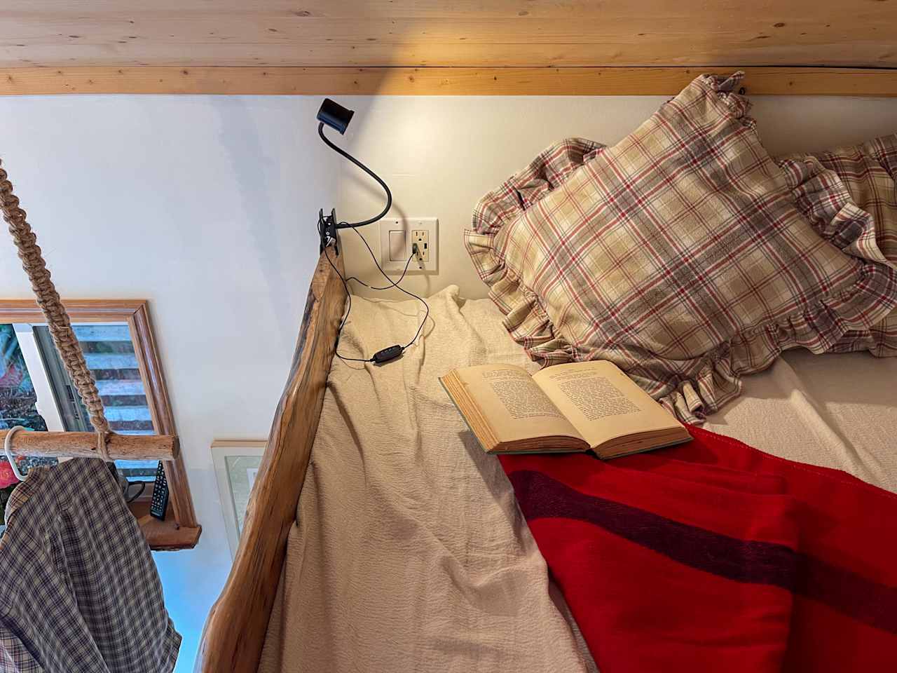 A cozy reading or sleeping nook up on the loft.