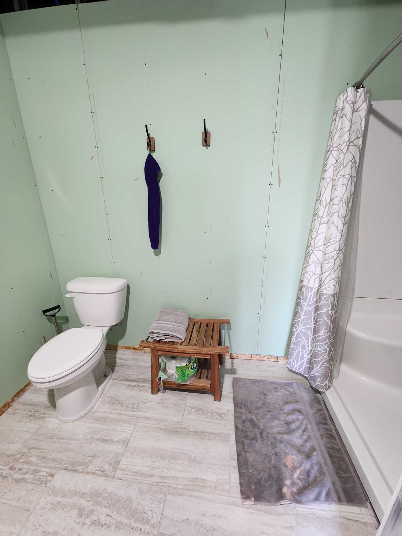 Guest bathroom located in the main house. Complimentary fresh towels for the shower and hot tub. 