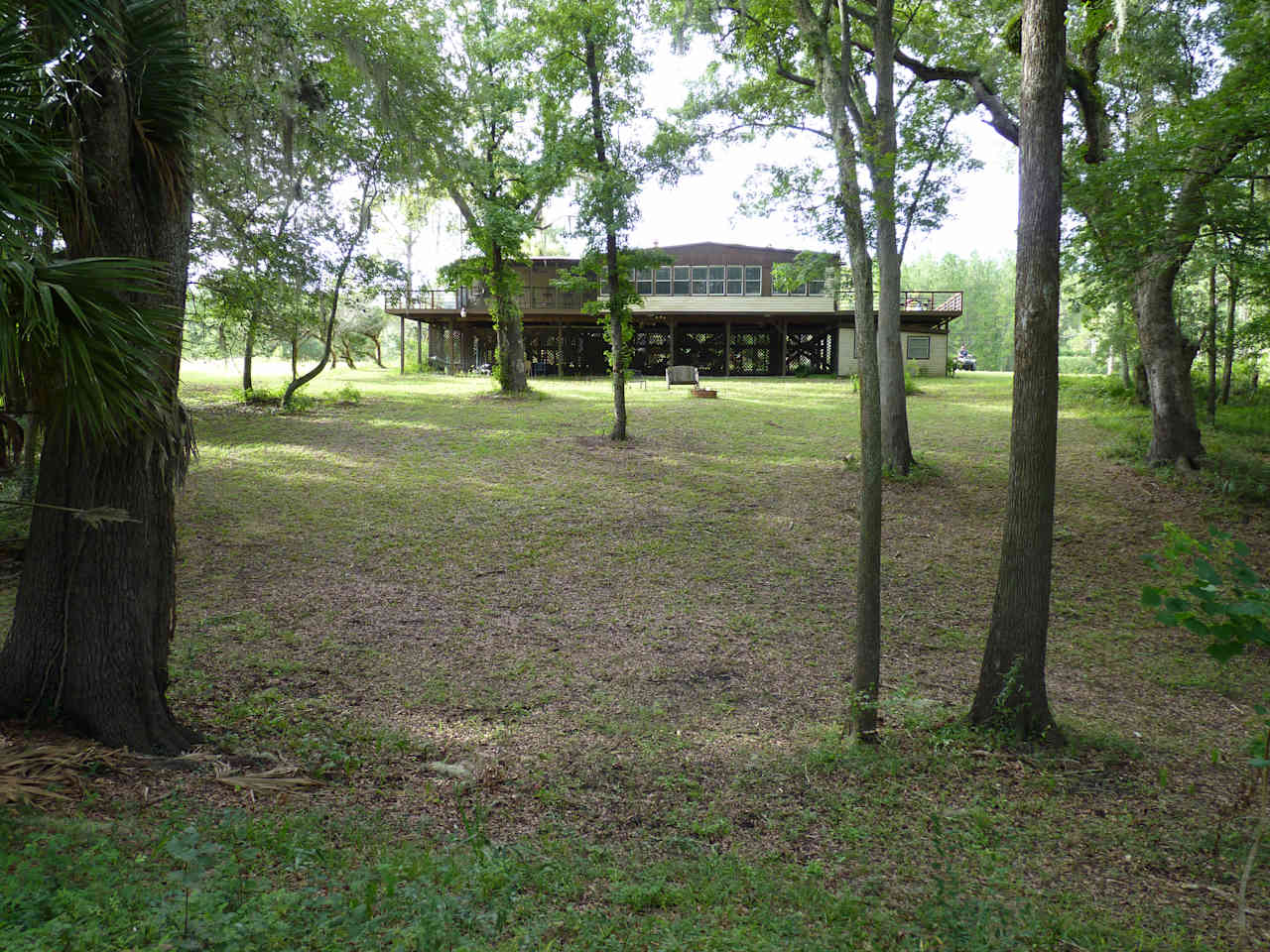 The back yard with the river to my back