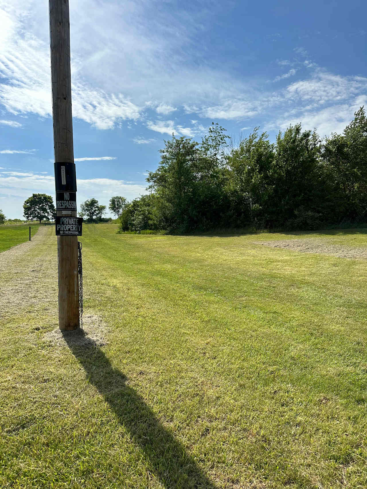 Property Entrance for all sites. Turn north (right) and follow the path to the. final parking area. Then walk to sites.