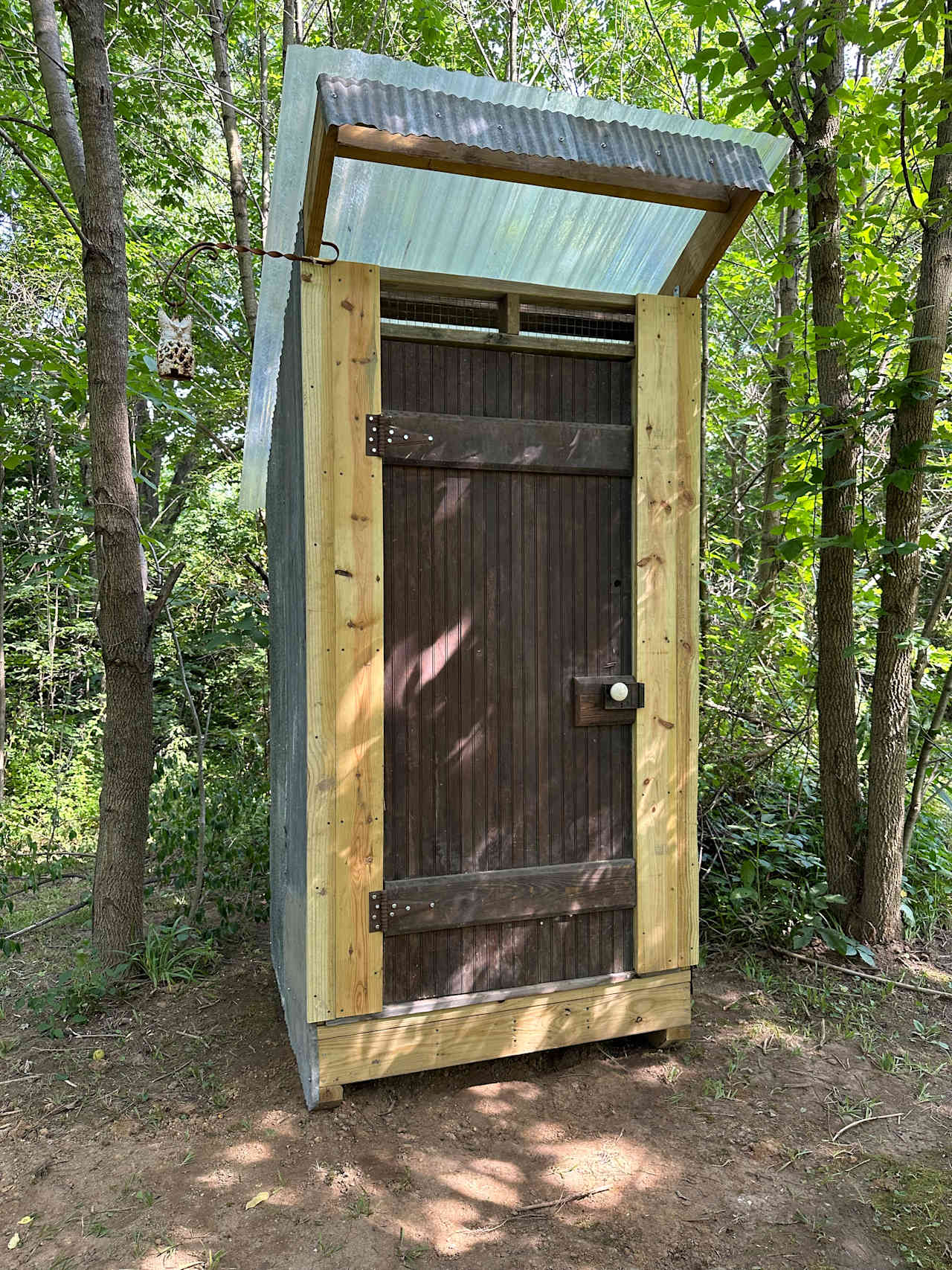 Communal outhouse for all sites.