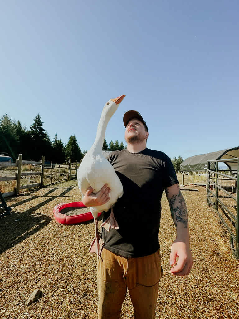 Mike, a very knowledgeable farm tour guide and his best friend, Maverick.