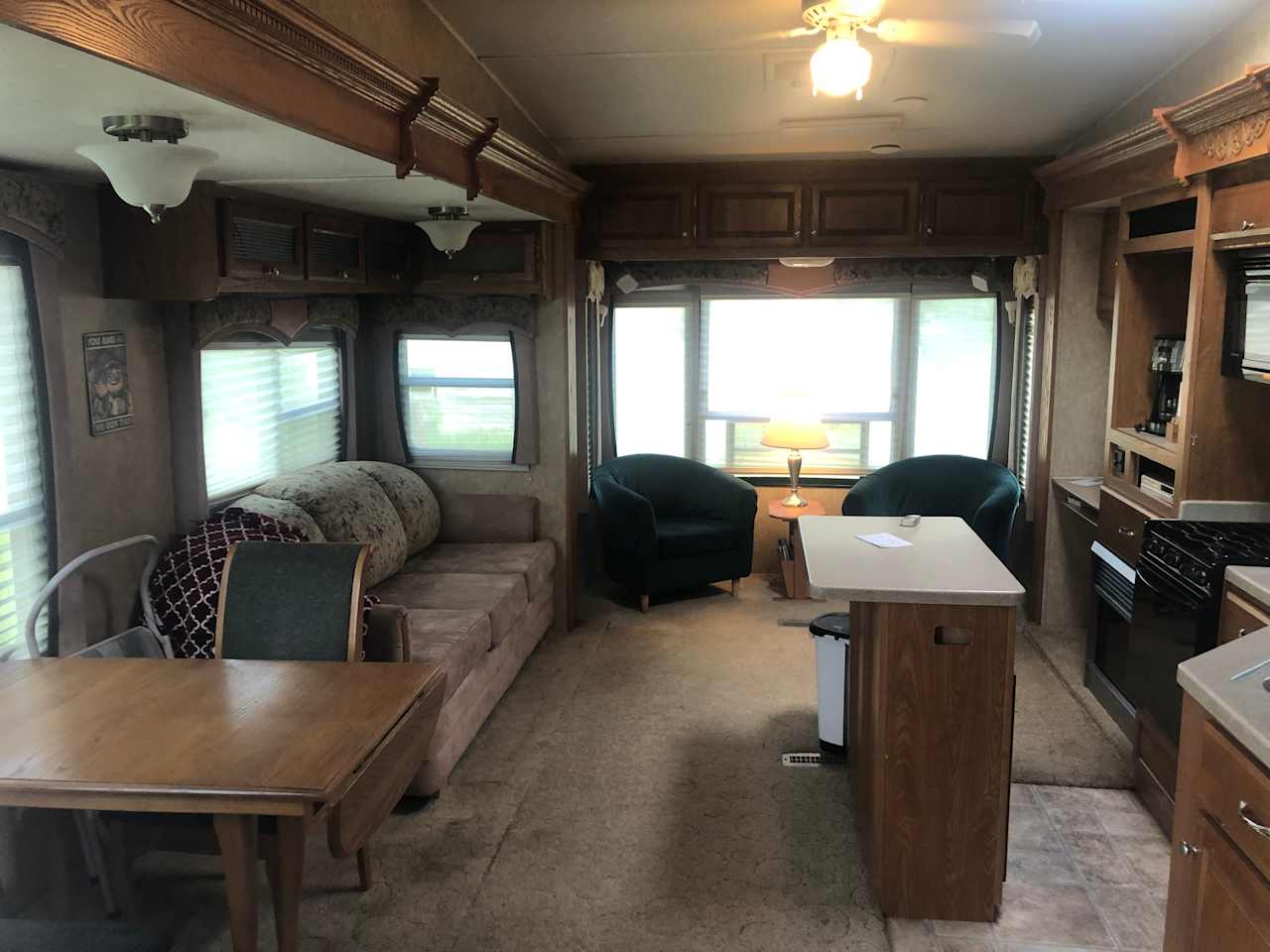 Spacious living area; couch pulls out into a queen bed (additional linens provided).