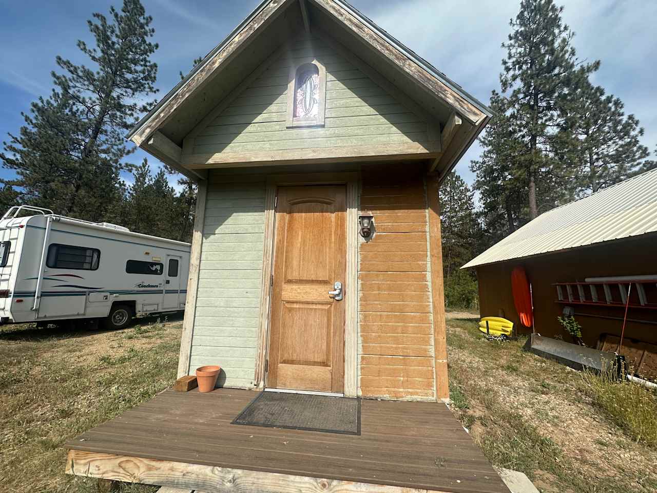 House is next to our garage.  Maybe we'll finish painting someday!