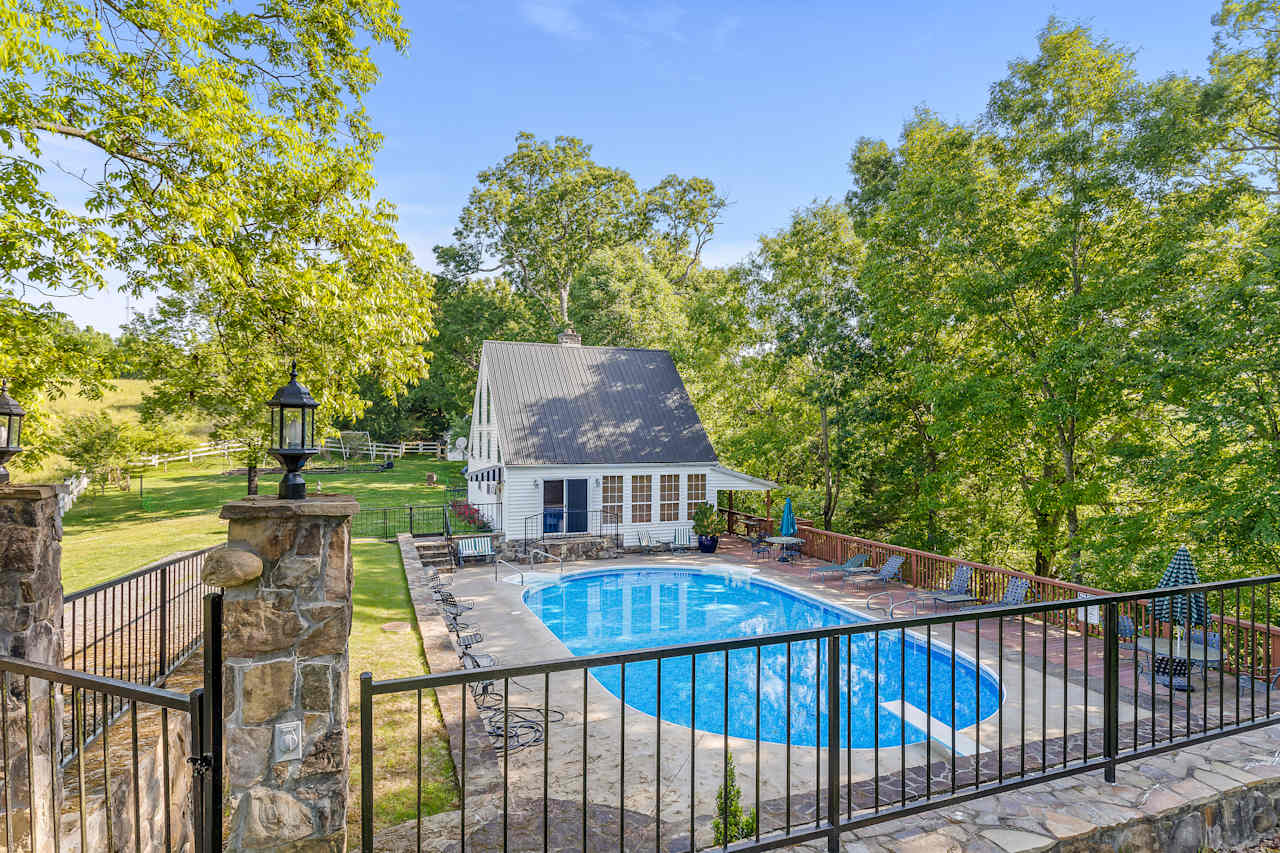 Pool is up the hill, and can be rented for $20/hour. 