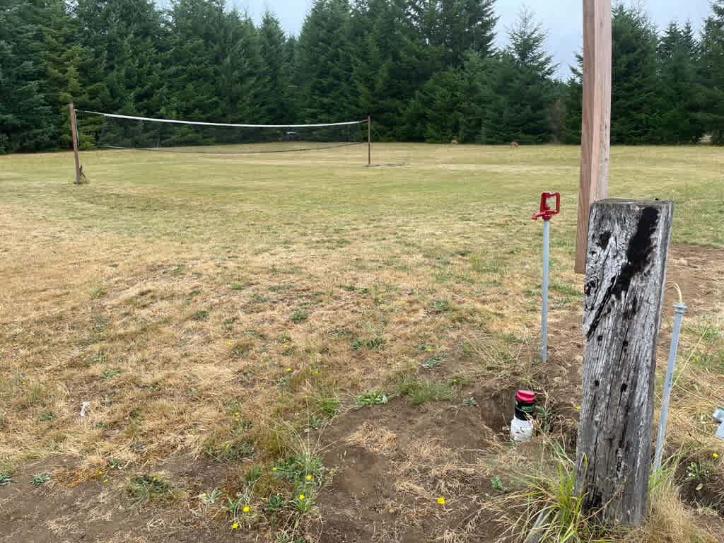 Site 1 near the big playing field and volleyball. Full hook-ups.
