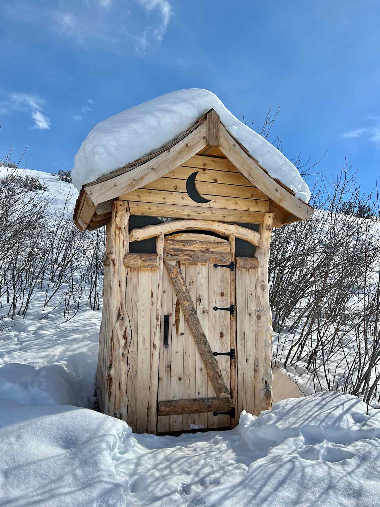 Of all features at the yurt, we are most proud of (and also most in love with) this little building right here: the outhouse. Possibly because we made it from scratch, spending days harvesting the wood, scribing the boards, bringing the vision to life. Possibly because it's a compost toilet that doesn't stink. Possibly because it is roomy and can double as a changing room. In any case, we hope you love it too!