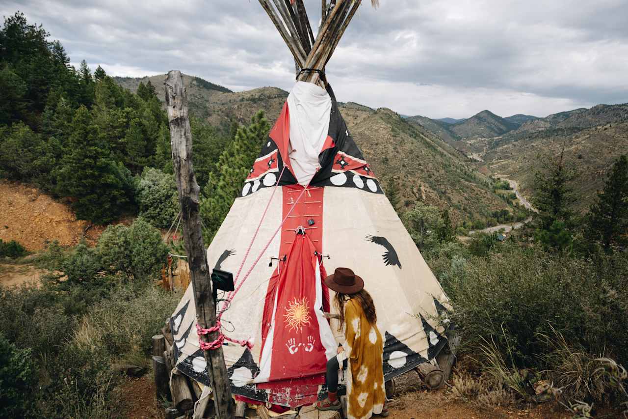 Tipi overlooks a beautiful mountain range