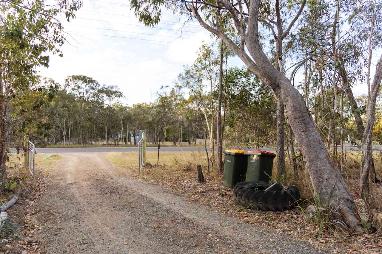 Garbage and recycling bins near the entrance