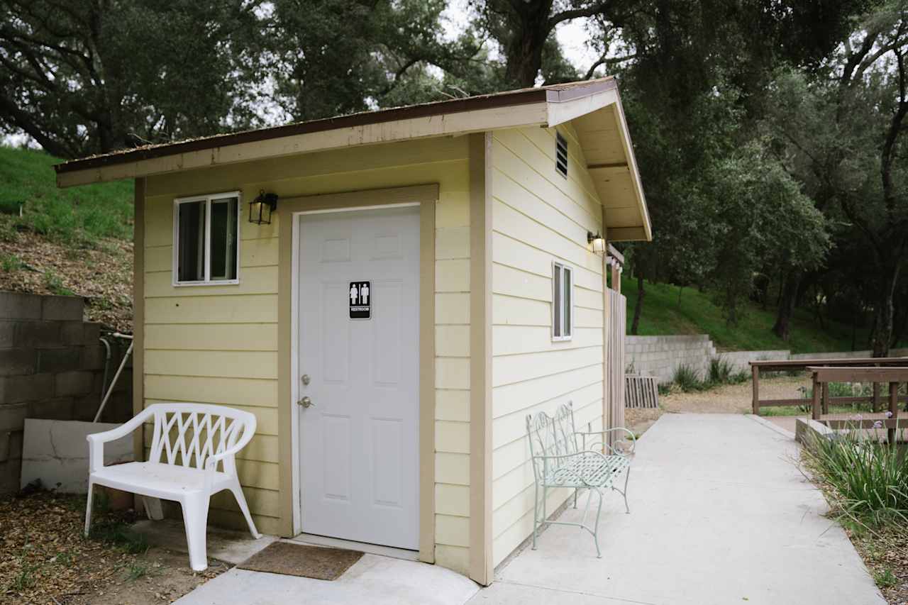 super clean restroom with flush toilet 