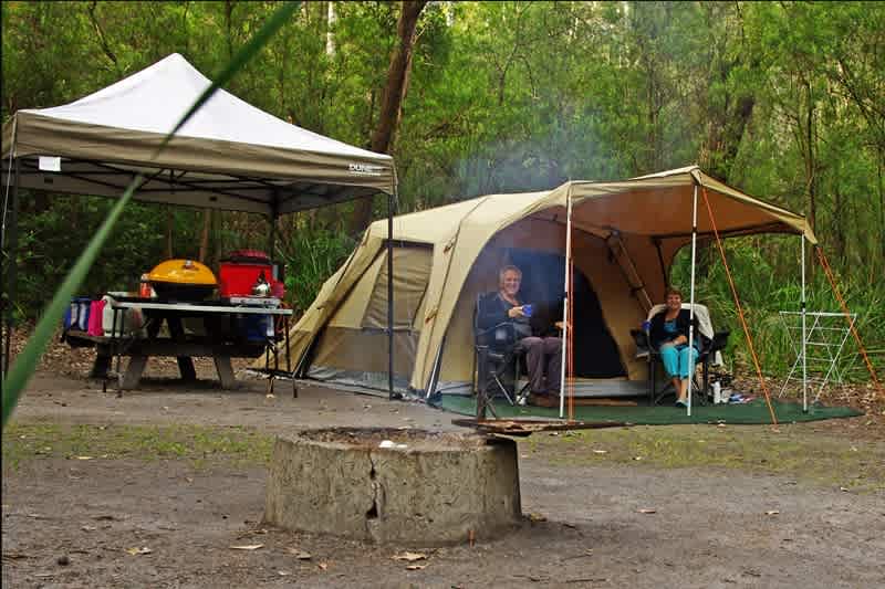 Diane and Chris enjoying the relaxing camp (note our BBQ's have since changed to plate)