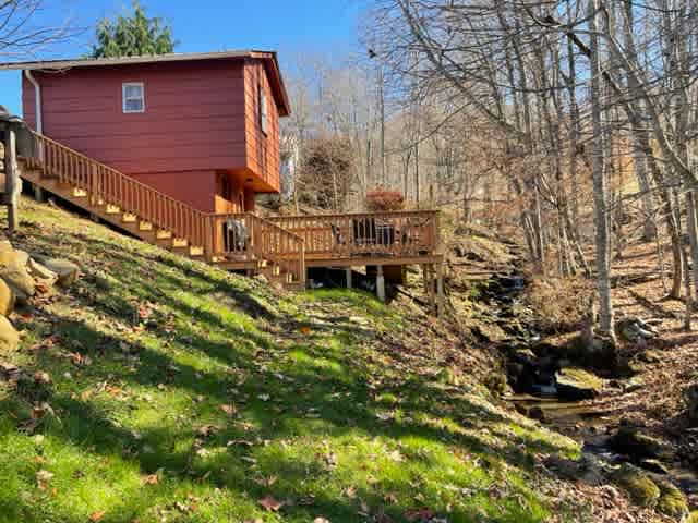 view of cabin from the orchard