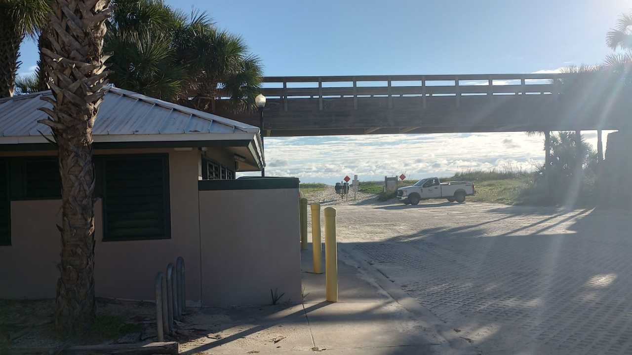 16th road EAST beach entrance. Clean bathrooms. (.6 mile)