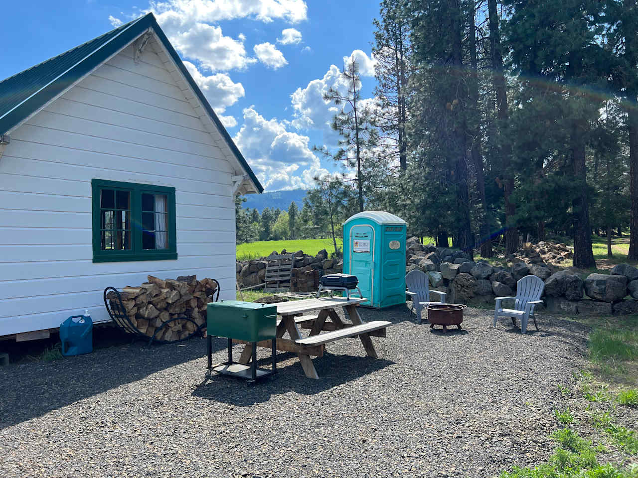 Outdoor space! Porta potty for your use and picnic table, propane grill and fire pit (only permitted when not in a burn ban). 