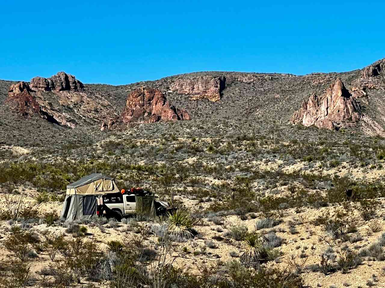 Red Rocks of the Solitario in background