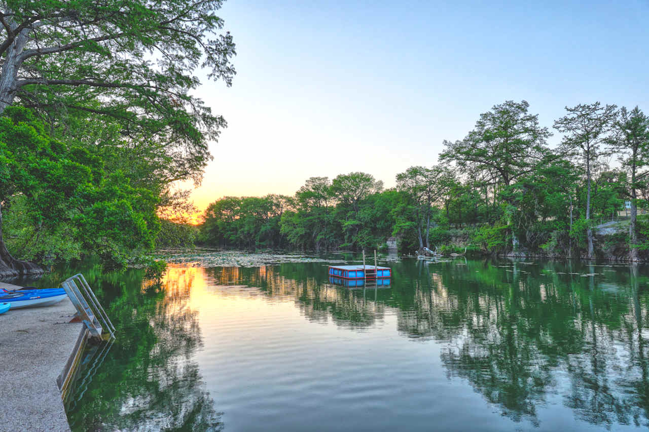 The Waltonia floating dock. Our section of the Guadalupe River is deep (about 6' at the riverfront). Great for fishing and swimming.