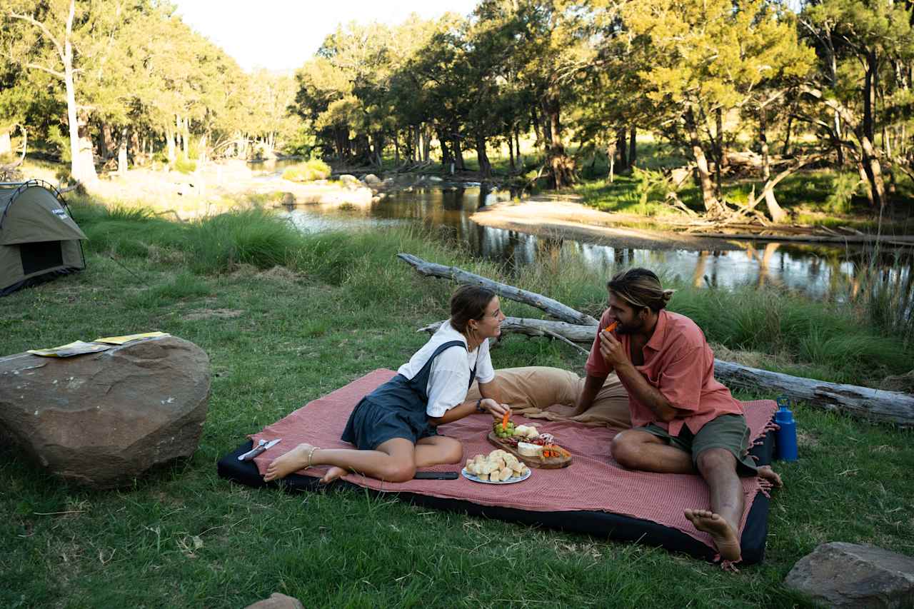 Enjoy an intimate picnic by the river