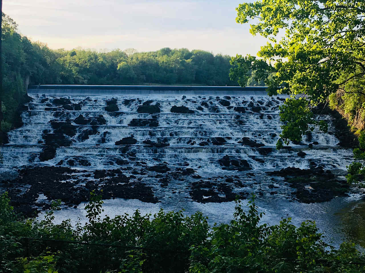 The dam is a 1/2 mile hike from campus or a short drive. You can hear the spillway from camp on a quiet night.