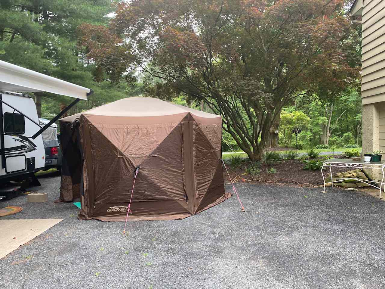 Optional Clam Shell Tent that can be set up as a Changing/Luggage Room for large parties OR as an outdoor/screened dining/relaxation space.