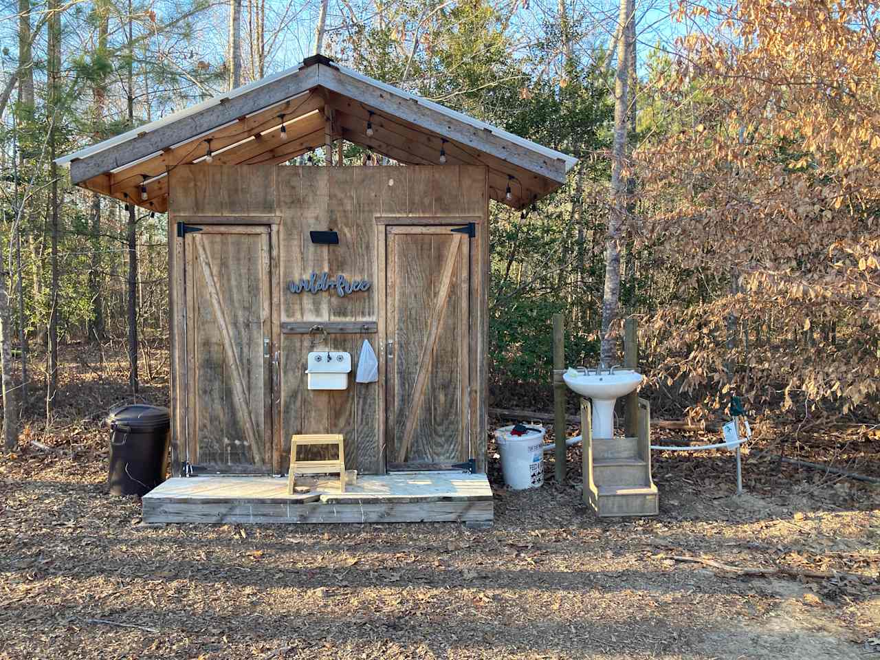 Outhouse with running cold water