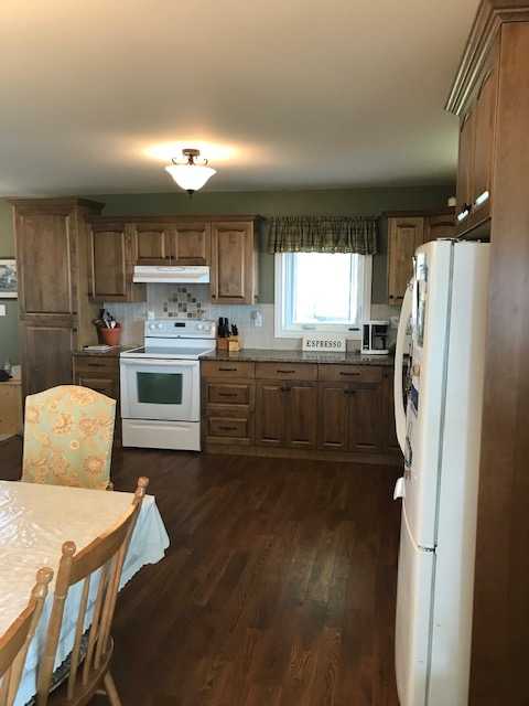 Custom cabinetry, tons of counter space and gorgeous views out of every window.