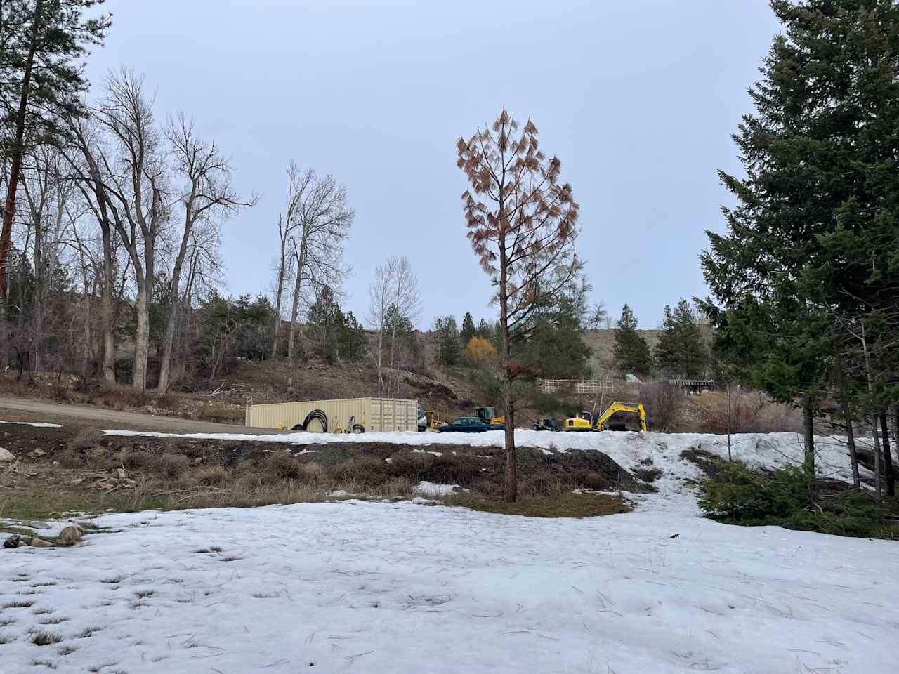 View of heavy equipment house just few feet away from Rv site 