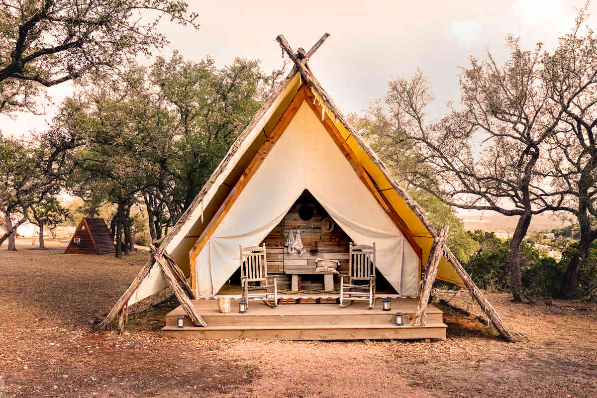 The front entrance of the Grand Arrow tent, the canvas side. The back side is floor-to-ceiling glass.