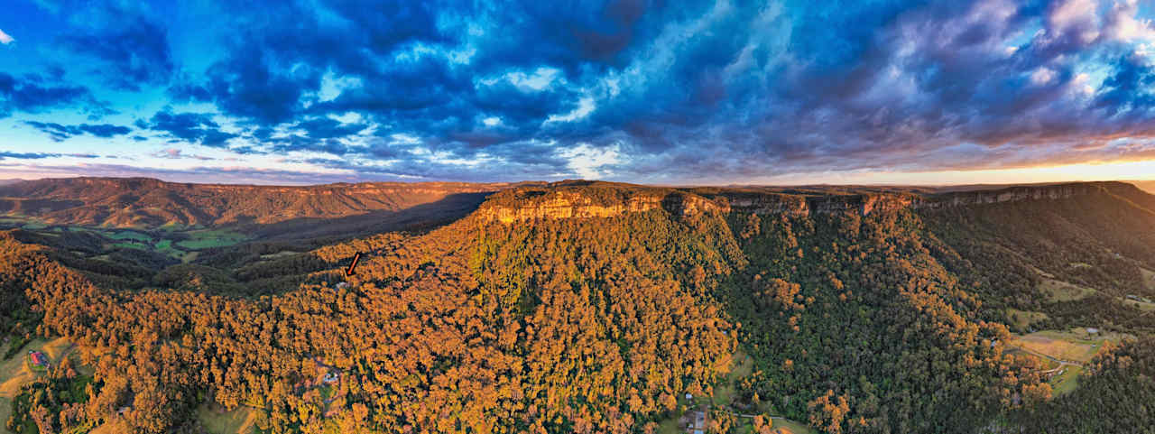 Look for the small orange arrow - it's pointing to the property which sits on a ridge line that leads right to the top of the escarpment.