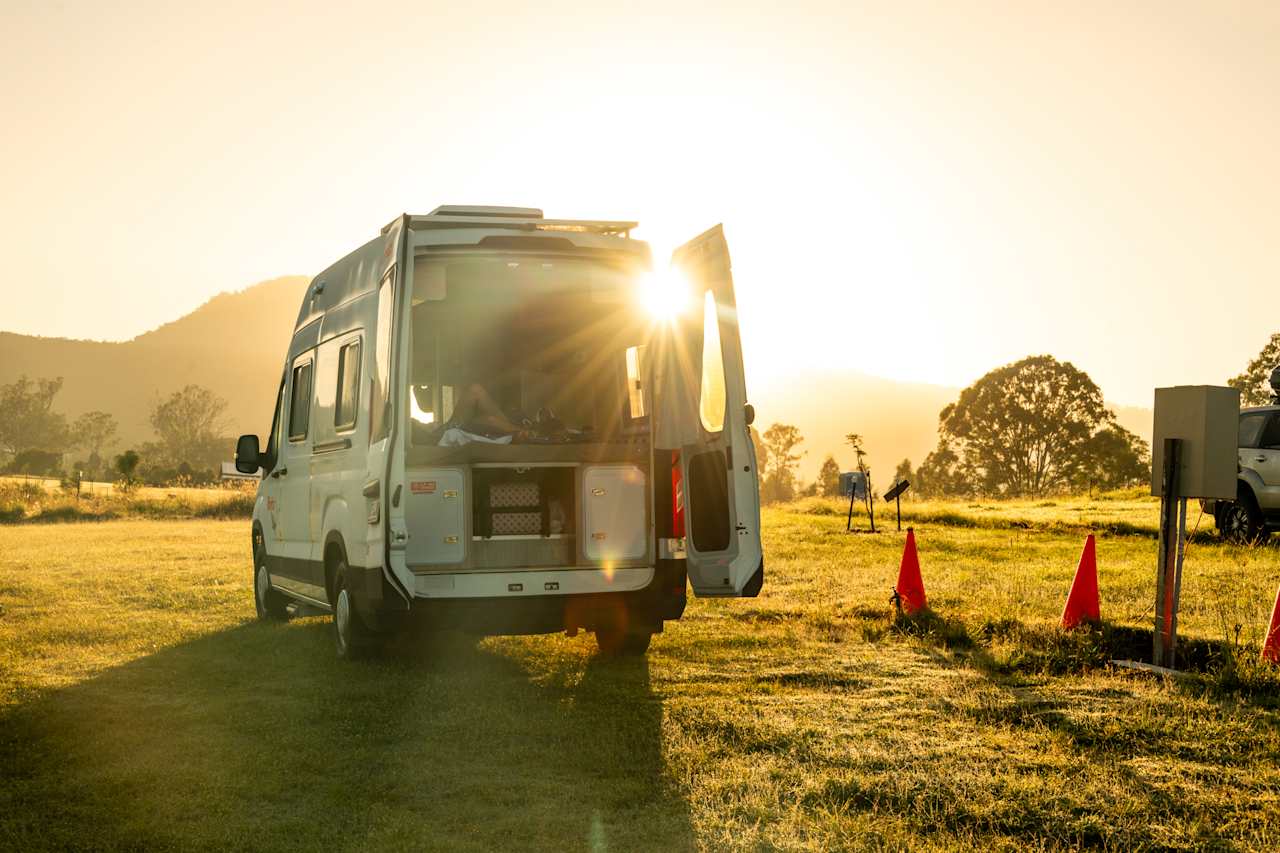 Relaxing in our van at sunset