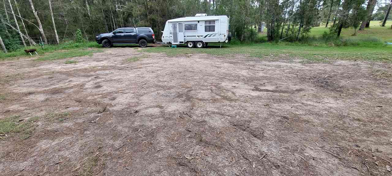 Site 2. Large site. Standing near creek, plenty of room for a group