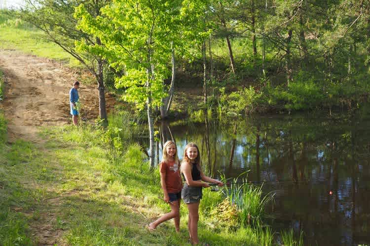 Many love to spend time fishing in our stocked pond.