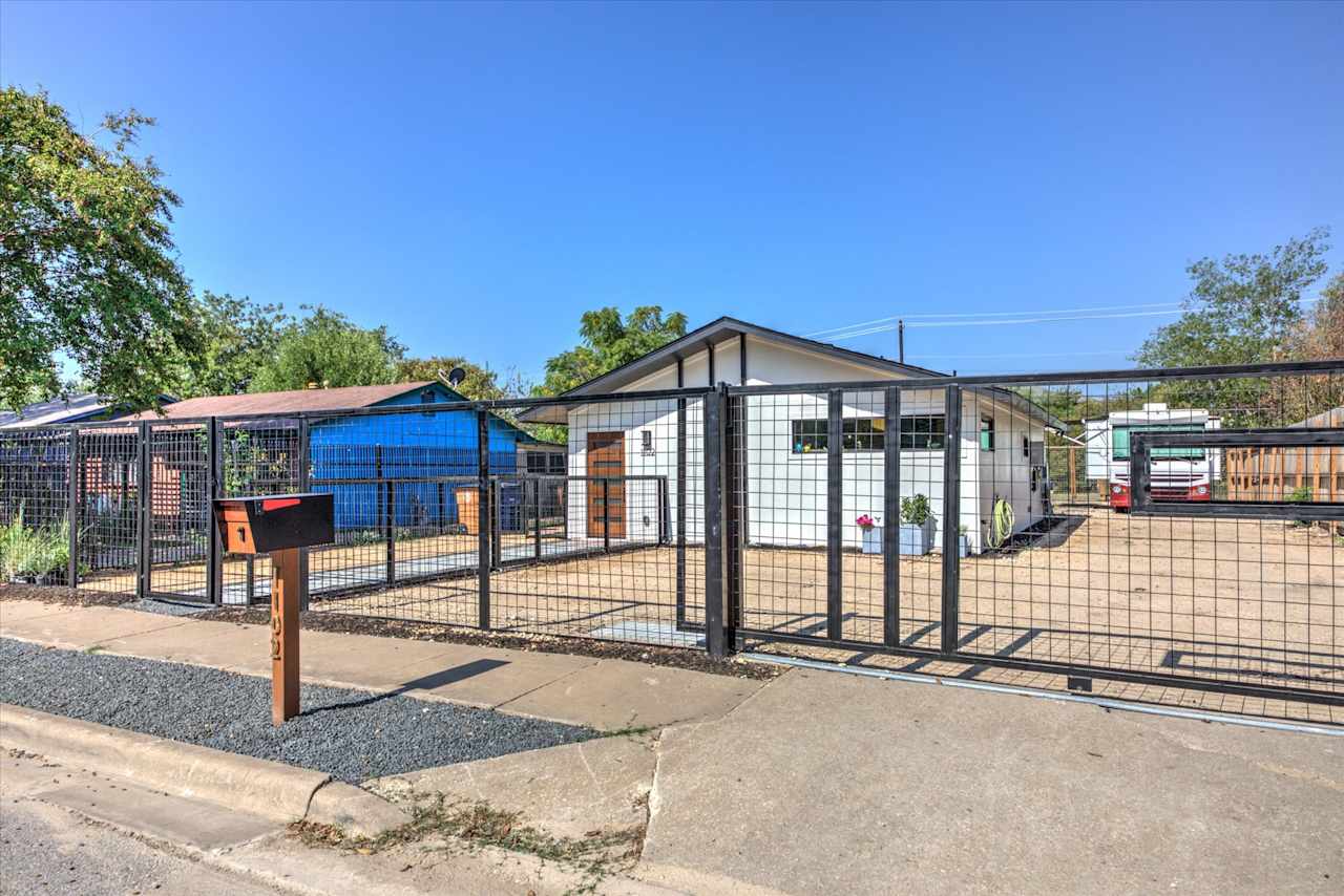 This gives an idea of width of gate, about 12 feet. Your RV would/could be where my RV is sitting...the back end of 100' lot.