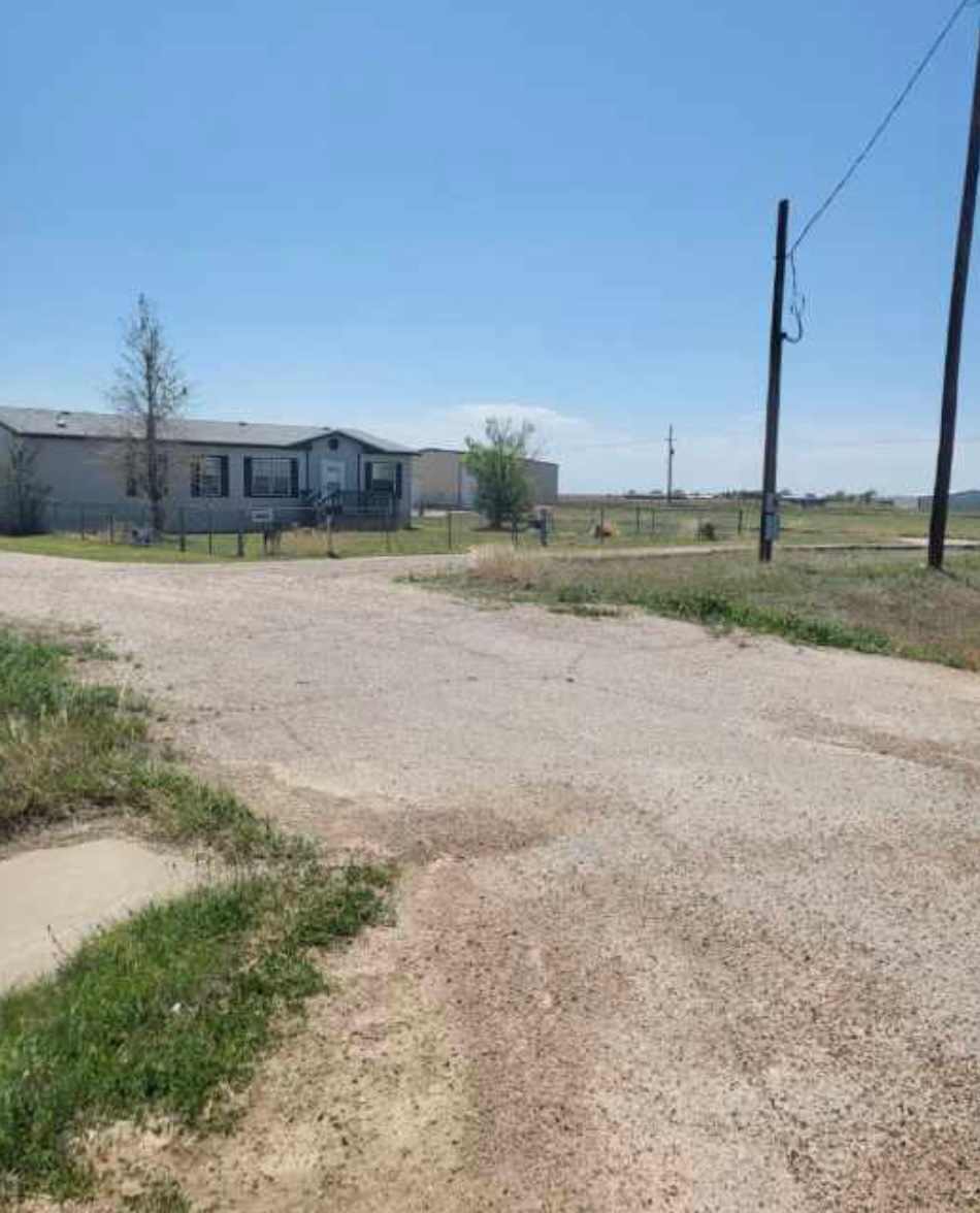 This is one of the driveway entrances to the circular drive in front of my house. You can pull in anywhere and we will get you situated and checked in