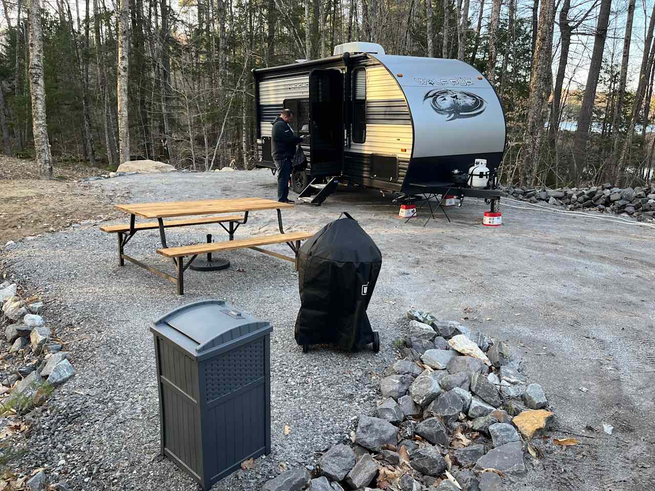 The picnic table and grill