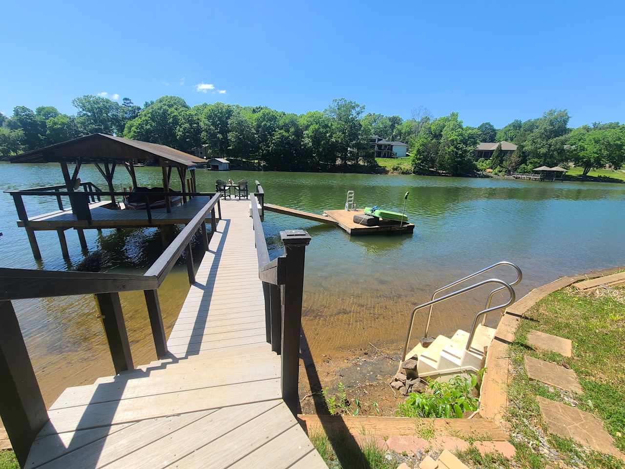 New spacious dock, floating dock with ladder, water access from retaining wall.