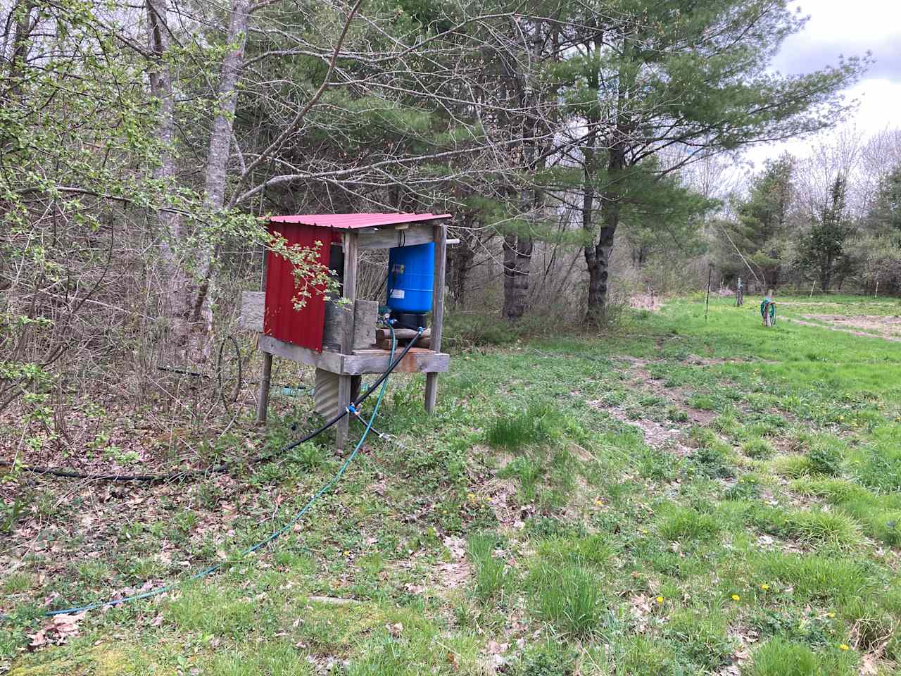 Dug well provides a hose with non potable water.