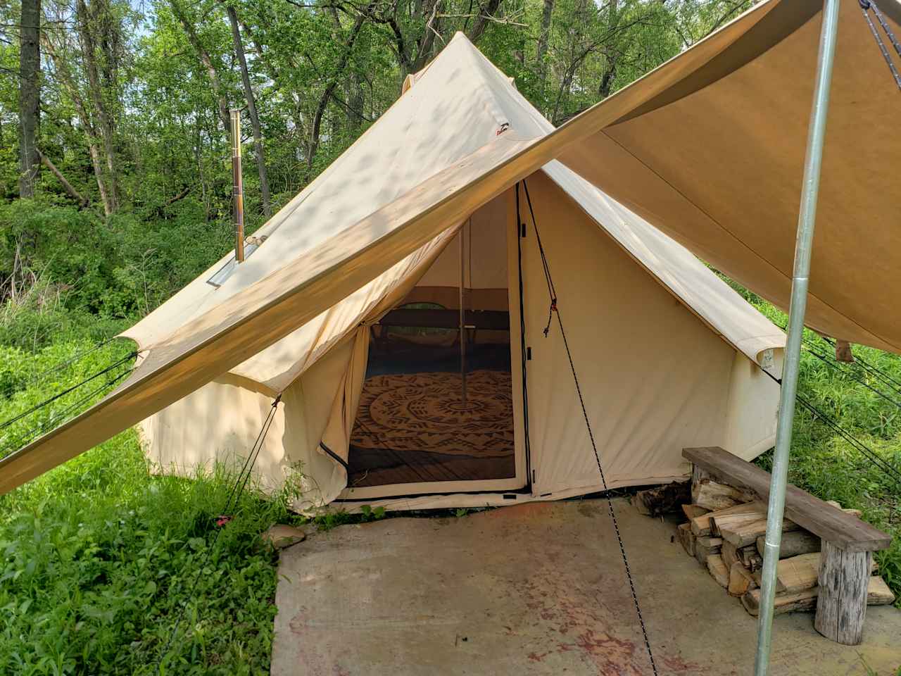 The large canopy adds space to stay under cover, keeps the entryway dry, and is a great spot to remove your shoes.