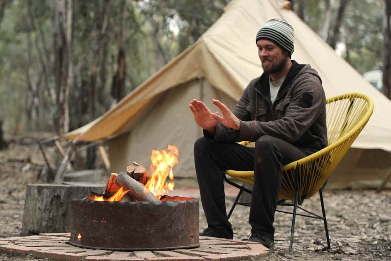 Enjoying the fire pit at Little Bell glamping tent 