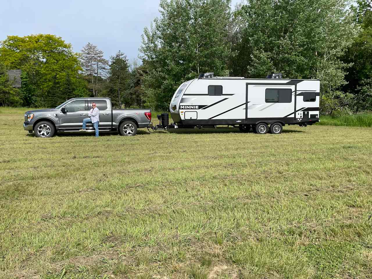 Our rig by the forested part of the farm.