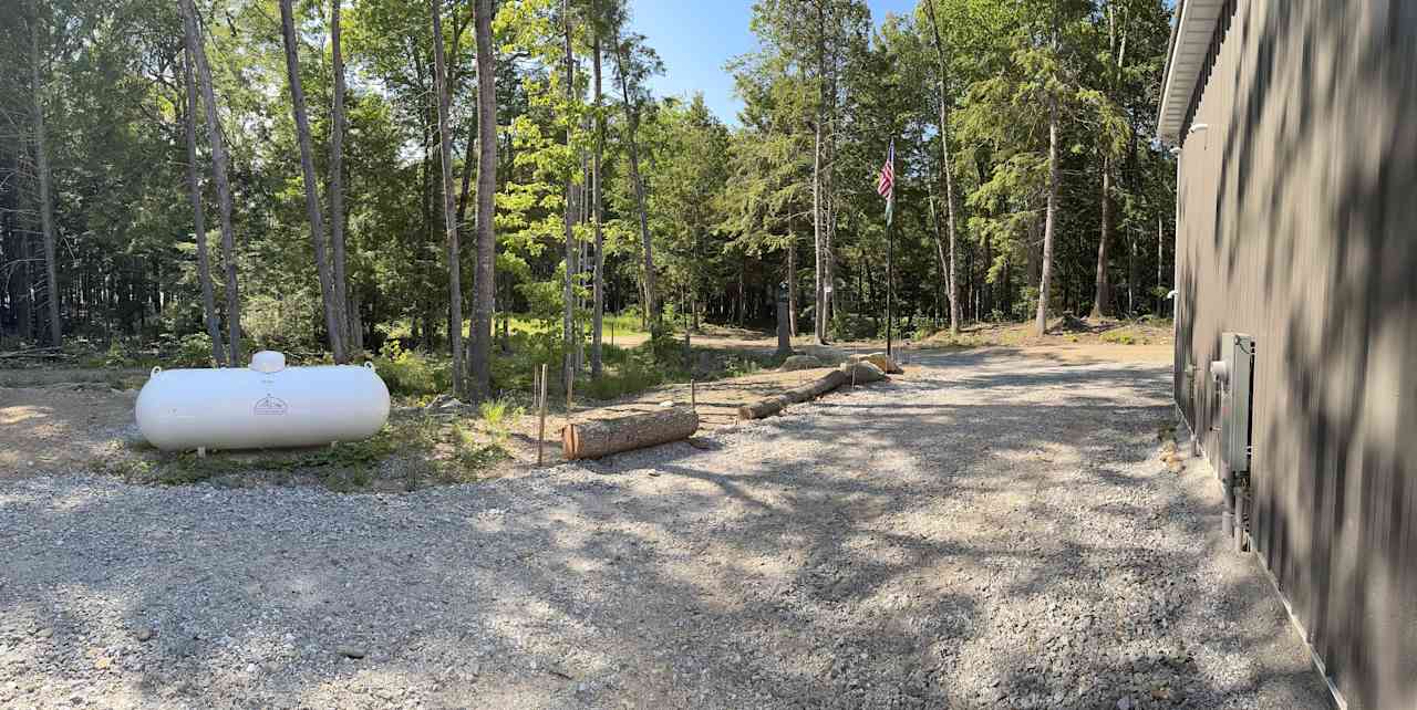 Firm, graded, gravel pad.