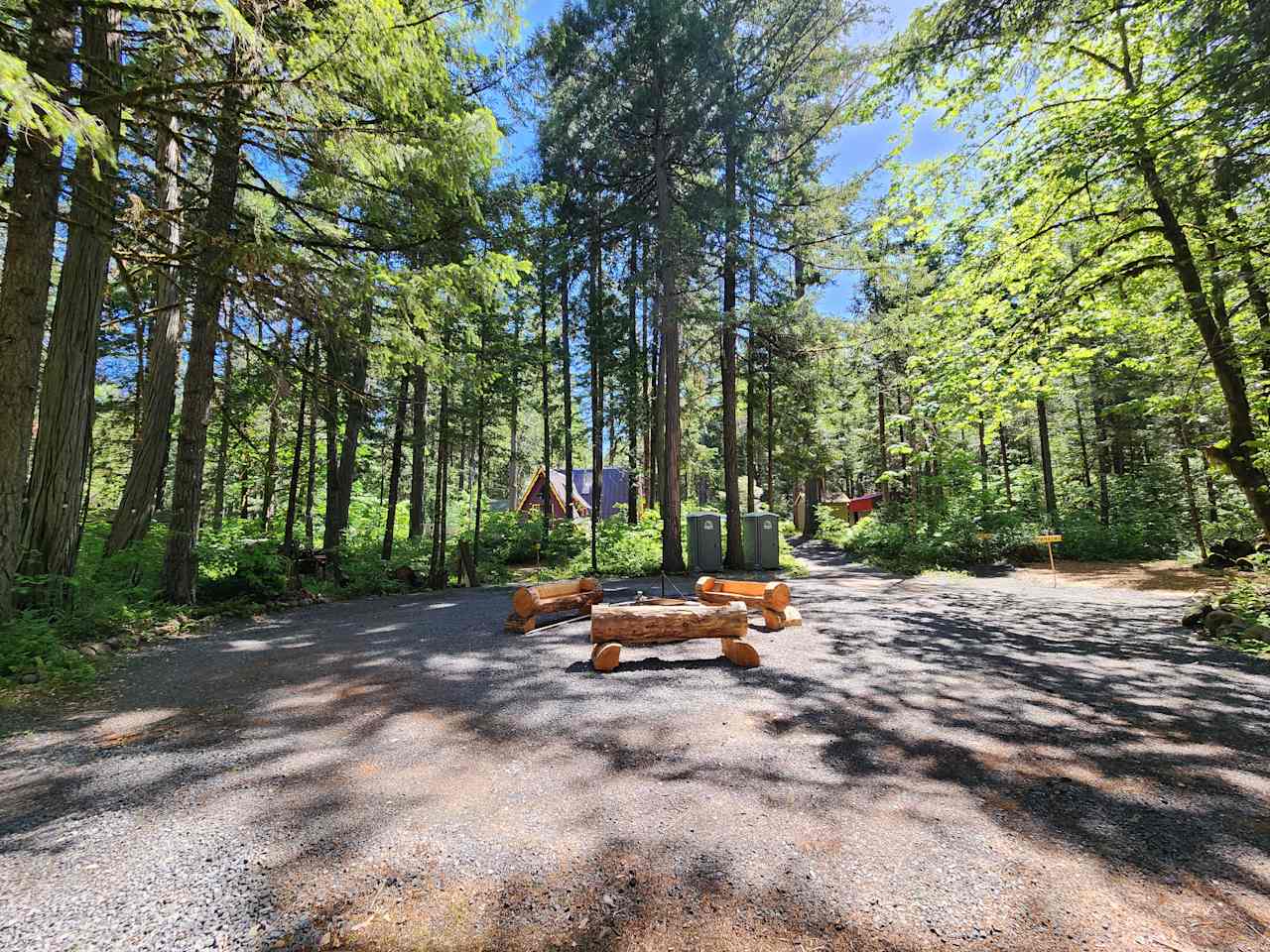 The heart of it all. The central gravel area with firepit and log benches. 
