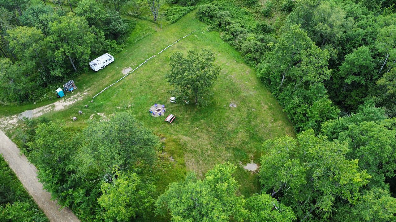 Your campsite has plenty of room to let the dogs and kiddos run around and have fun! Enjoy the 2 hammocks, go to the peaceful outdoor library by the creek.  Enjoy!  Relax! 